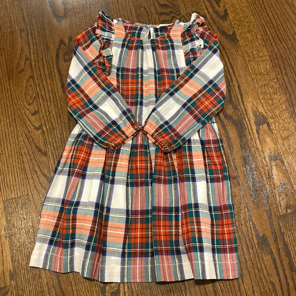 Beautiful plaid dress with gold detailing and frills